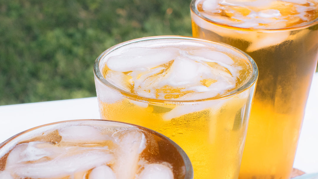 Three pints of iced tea outside.