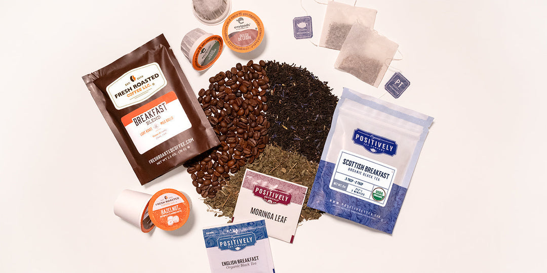 Image w/ coffee, tea, and botanicals on bottom. Surrounded by k-cups, envipods, coffee bag, positively tea bag and tea bags, as well as a positively botanicals tea bag.