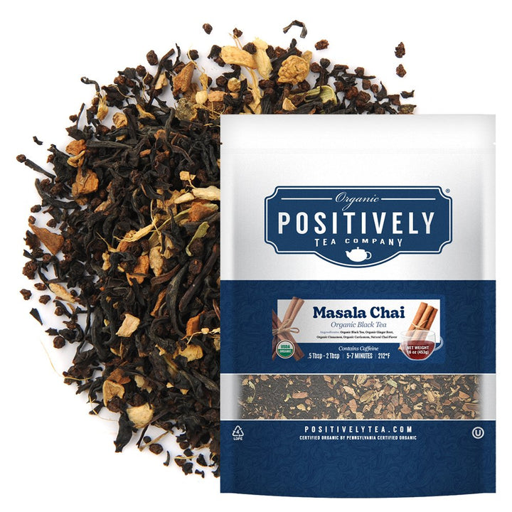 Positively Tea Company Masala Chai Organic Black Tea, 16oz bag displayed with loose tea leaves, highlighting a spiced and warm flavor profile.