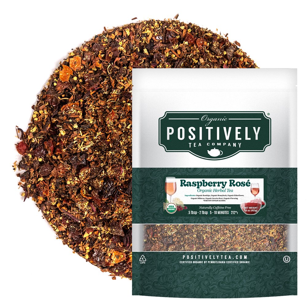 Positively Tea Company Raspberry Rosé organic herbal tea, loose leaf blend displayed alongside resealable 2 oz bag.
